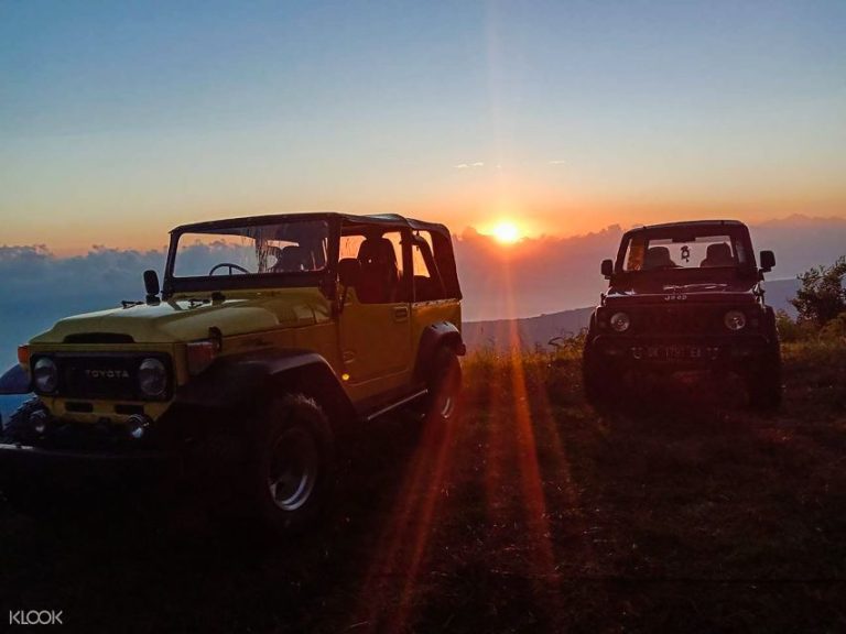 Bali Jeep Tour: Two Jeeps at sunset. Experience Bali's beauty. Perfect for gay travelers seeking adventure. Book your tour and Waterbom Bali tickets now!