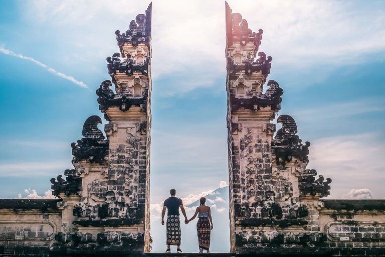 Gay couple at Bali Handara Gate. Bali tour travel advice. Waterbom Bali ticket, instant entry. Vacation in Bali, Indonesia.