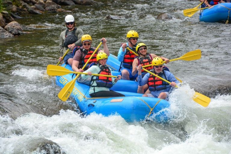 Gay group rafting on Bali Waterbom tour. Whitewater adventure with helmets and life vests. Exciting instant entry ticket activity. Bali tour.