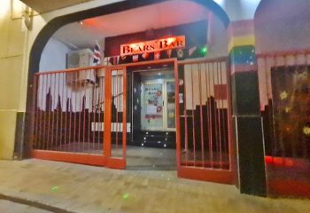 Bear's Bar, gay bar in Benidorm, Spain. The entrance is decorated with a British flag and rainbow colors. Gay travel destination for drinks & party.