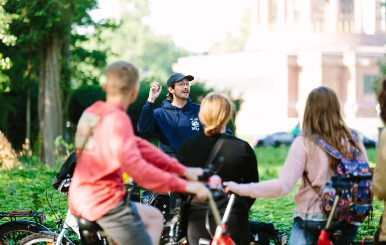 Berlin bike tour: Guide explains history to cyclists. Ride through history in 3 hours. Gay travel advice for exploring Berlin.