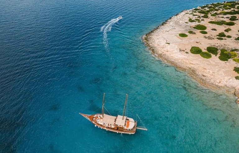 Aerial view of a chic Saronic Islands day cruise near Agistri, Moni, and Aegina. Gay men's travel advice for Athens, Greece.