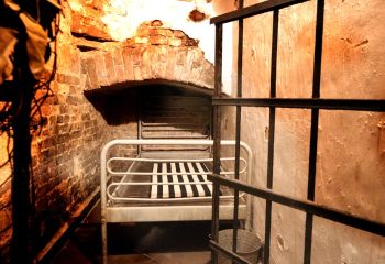 Coxx Men's Bar, Budapest. Bunk bed inside a brick-lined alcove. Gay travel advice. Cell-like. Budapest gay bar. Men's bar.