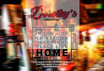 Dorothy's Bar Singapore, a gay bar in Chinatown. Bottles of liquor line the bar. In the heart of Chinatown, there's no place like home.