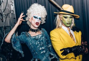 Garcons Budapest event: Two drag queens in costume. One in a blue dress and the other in a yellow suit. Gay nightlife in Budapest.