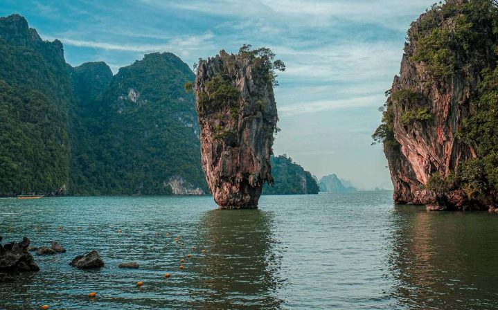 James Bond Island, Phang Nga Bay, Thailand. Gay-friendly luxe yacht adventure. Limestone cliffs and turquoise waters. A tropical paradise.