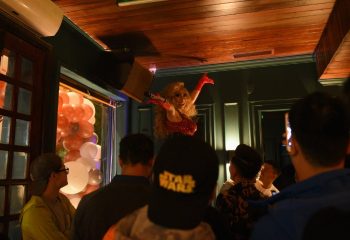 Drag queen performs at GC Bar, a gay bar in Hanoi, Vietnam. Crowd watches the show. Gay travel advice.