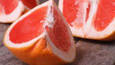 A close-up of grapefruit wedges