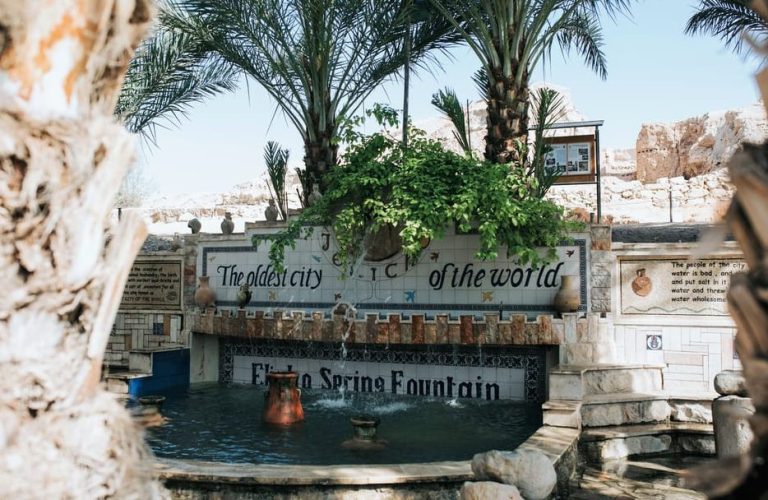 Elisha Spring Fountain in Jericho, West Bank. The oldest city of the world sign, palm trees. Holy historic day trip from Tel Aviv.