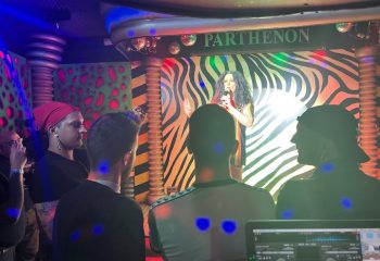 Parthenon Gay Cruise Club in Torremolinos: Drag queen performs on stage. Gay men enjoy the show at this popular gay travel destination.