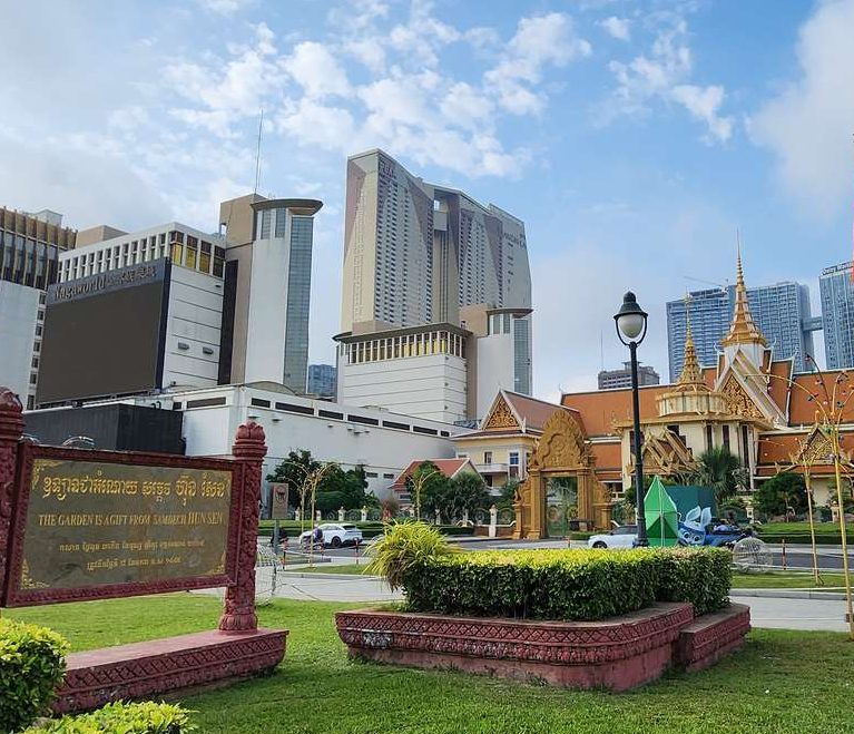 Phnom Penh city tour: modern buildings and traditional Khmer architecture blend. Visit S21 Killing Fields for history & culture. Gay travel advice.
