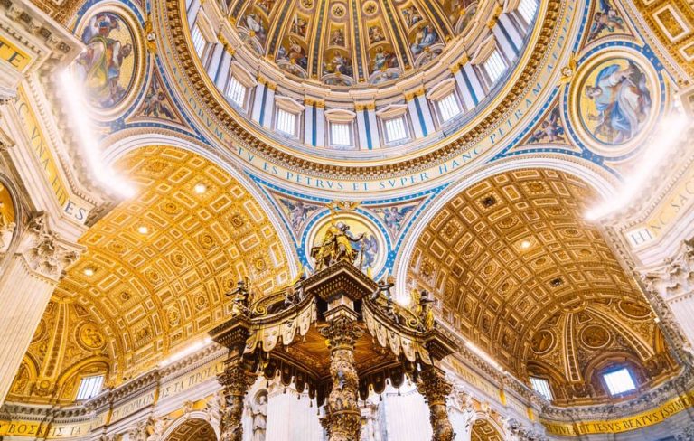 Vatican Tour: St. Peter's Basilica interior. Ornate gold ceiling with mosaics & religious art. Gay travel to Rome. Sistine Chapel.