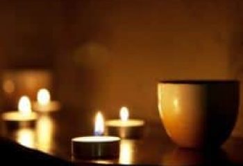 Candles and a bowl create a relaxing atmosphere. Gay massage spa in London. Tantric Soul Gay Massage London.