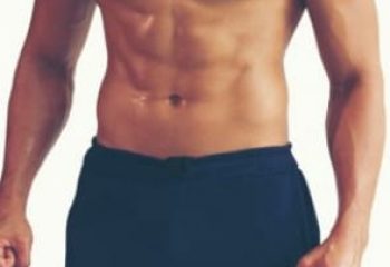 Torso of a muscular man for Tantric Soul Gay Massage London. Gay massage spa treatment. Male physique. Gay travel advice.
