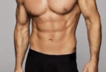 Torso of muscular man for Tantric Soul Gay Massage London gay massage spa. Male physique, abs, and arms.
