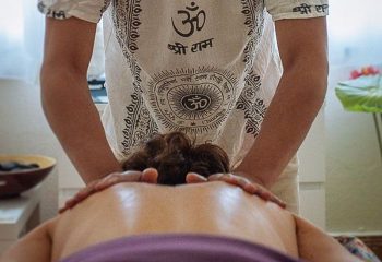 Thai holistic massage at Gran Canaria. Gay massage for relaxation. Man receiving back massage, wellness treatment. Travel advice.