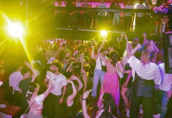 The George Gay Club Dublin scene. A crowded dance floor with people dancing and enjoying the vibrant nightlife. Gay travel advice.