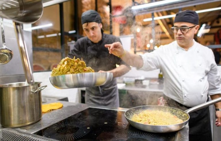 Chefs prepare a Barolo feast in Rome. Savor ultimate food with Italian cuisine, pasta, and culinary artistry. Gay travel food adventure.
