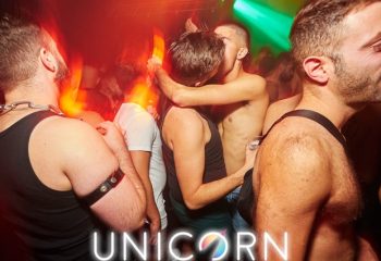 Gay men dancing at UNION Club, London. The Unicorn gay dance event in London features a dark sex room. Nightlife at its best.