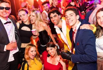 Group of people in costumes at Universal Sydney Halloween party. Gay travel advice. Costumes include Kill Bill and bloody outfits.