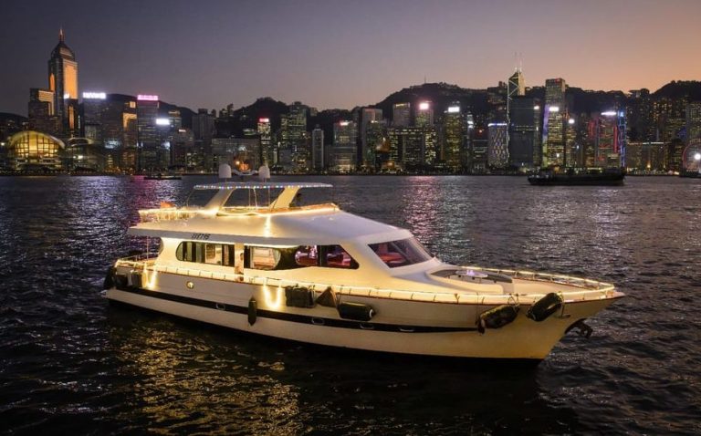 Victoria Harbour night yacht cruise. Luxe views & vibes in Hong Kong. Gay travel advice for a memorable experience.