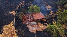 Aerial view shows a house destroyed by a fire in the surroundings of the SP-330 highway in Ribeirao Preto, Sao Paulo state, Brazil on August 25, 2024.